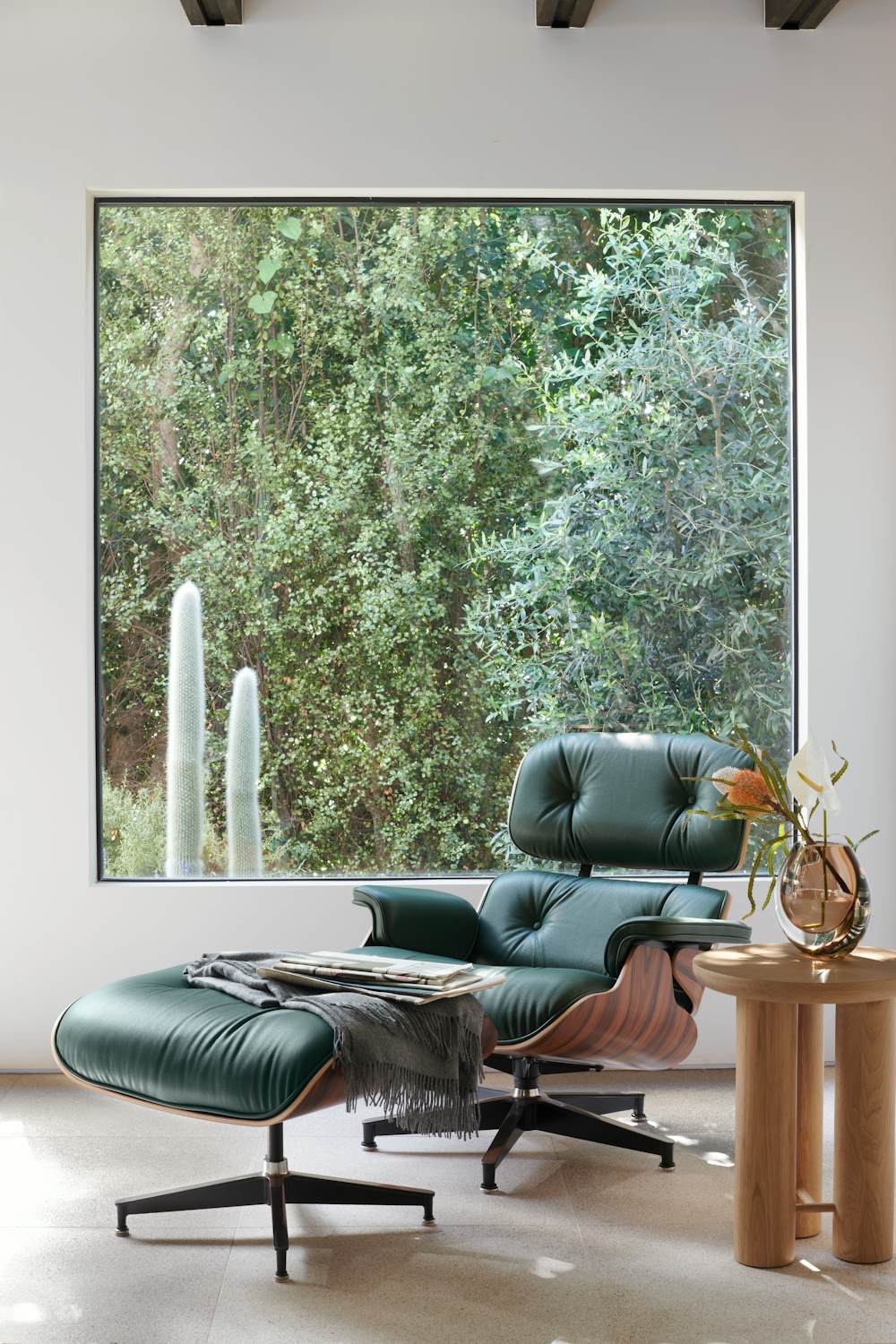 Eames Lounge Chair and Ottoman and Antropologia Side Table